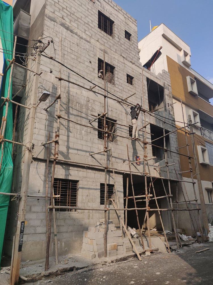 Building under construction with scaffolding